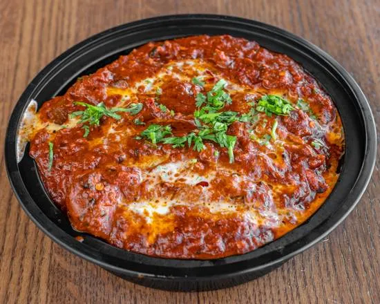Surti Rasawala Khaman - soft steamed chickpea cake in spicy gravy in Calgary